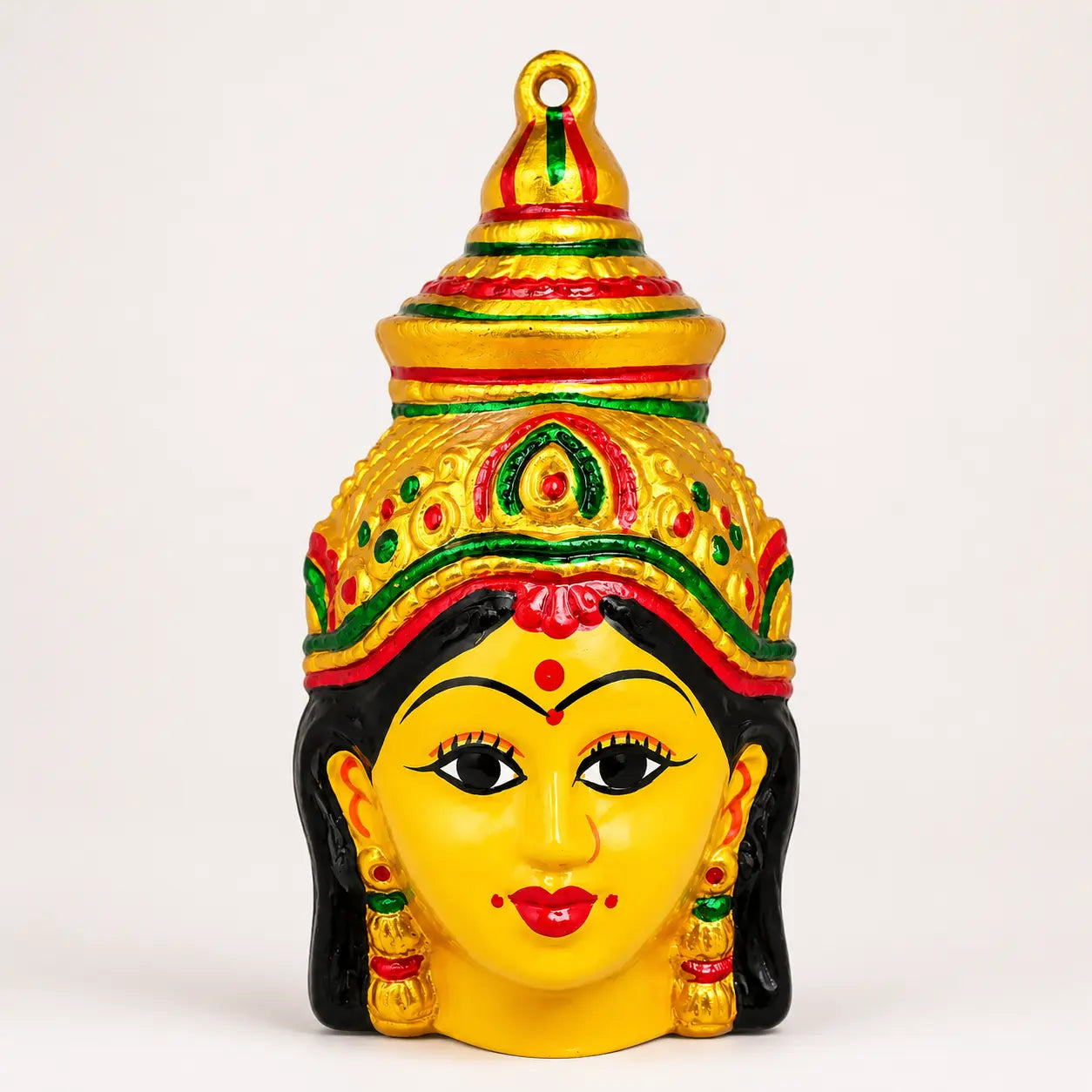 Decorative Varalakshmi goddess face with golden crown and red and green detailing
